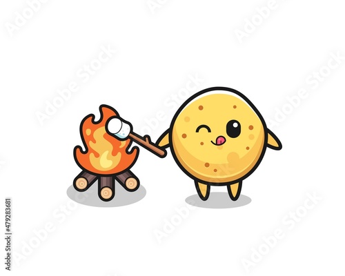 potato chip character is burning marshmallow
