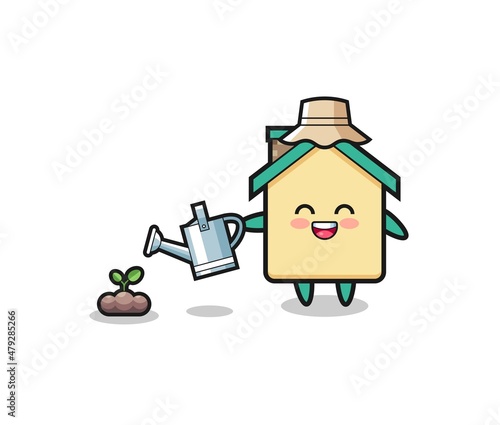 cute house is watering plant seeds