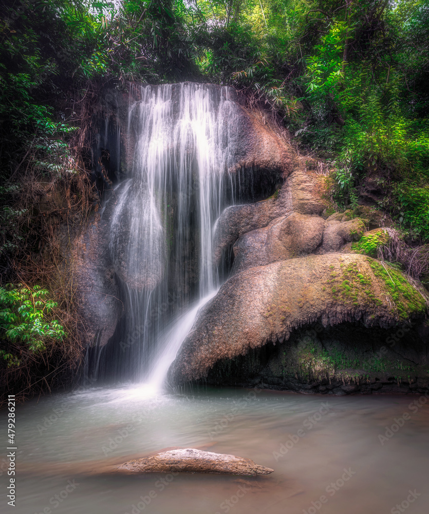 Obraz premium Plan Thong waterfall, located in Phu Pha Man National Park in Khon Kaen in Thailand. It is a small waterfall with a height of about 10 meters.
