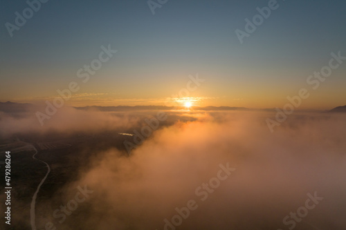 Landscape of dramatic Morning sky and sunrise with clouds, areial view