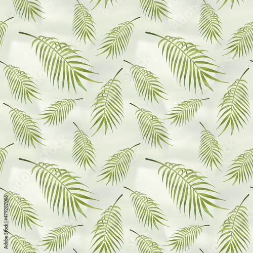 green tropical palm leaves seamless pattern