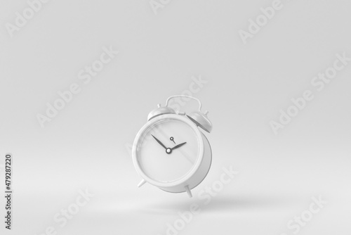 Retro alarm clock on a white background. minimal concept. monochrome. 3D render.