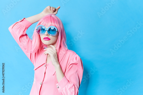 fashionable woman fashion blue glasses makeup fashion studio model unaltered