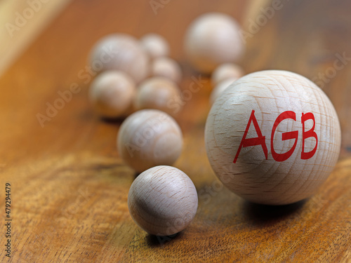 Holzkugel mit dem Aufdruck AGB photo