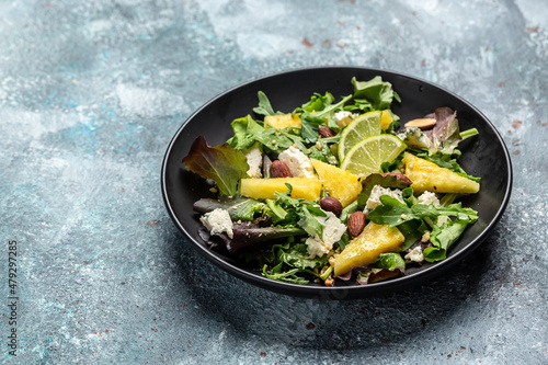 Diet menu. Healthy salad of fresh pineapple, blue cheese and almond. Vegan food. Long banner format, top view
