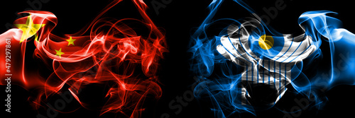 Flags of China, Chinese vs Commonwealth. Smoke flag placed side by side on black background.