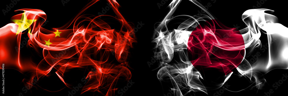 Flags of China, Chinese vs Japan, Japanese. Smoke flag placed side by side on black background. Flags of China, Chinese vs Japan, Japanese. Smoke flag placed side by side on black background.