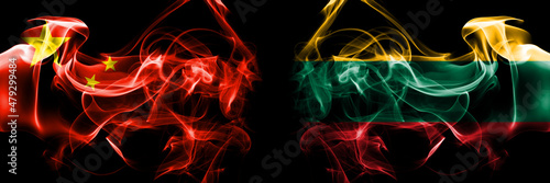 Flags of China, Chinese vs Lithuania, Lithuanian. Smoke flag placed side by side on black background.