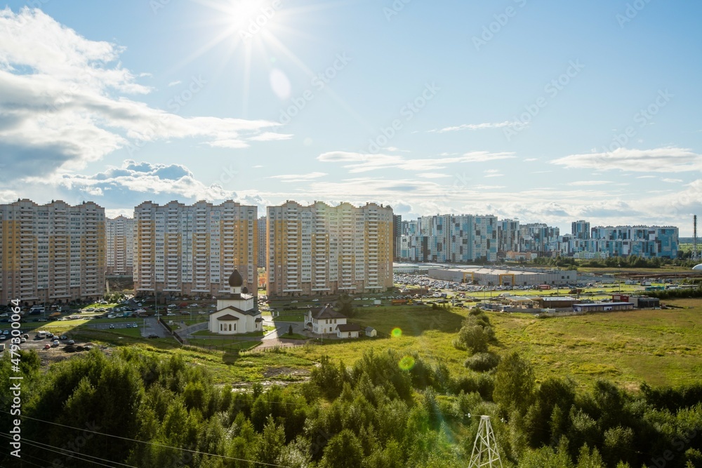 Obraz premium Beautiful sunny view on buildings and church