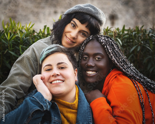 Portrait of multiracial diverse young woman smiling and looking at the camera photo