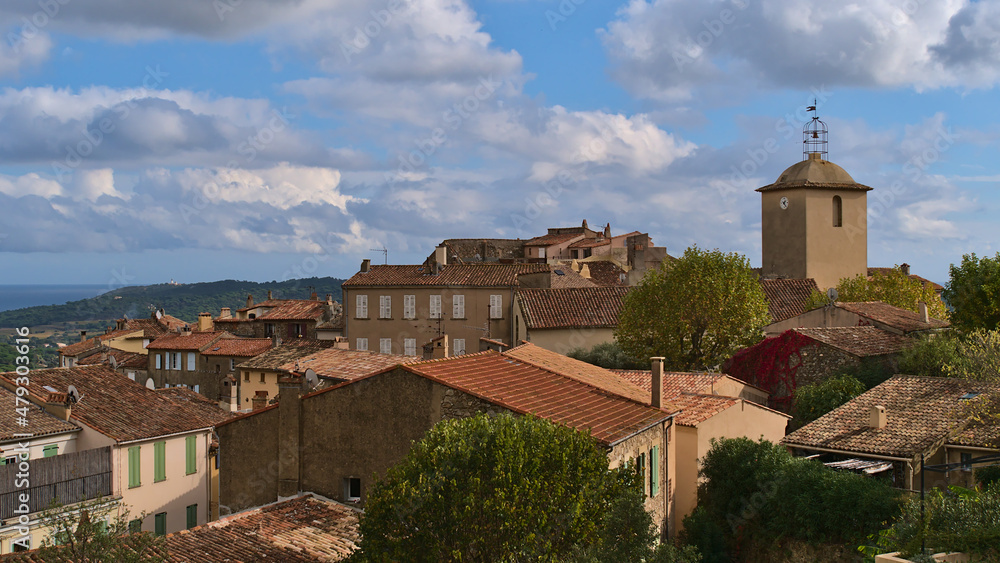 View over the historic center of small village Ramatuelle, French Riviera at the mediterranean coast with old church and traditional buildings.