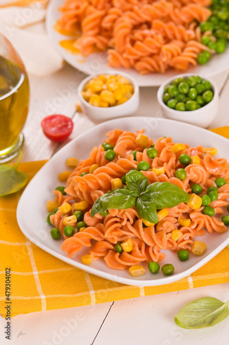 Fusilli pasta with peas and sweet corn. 