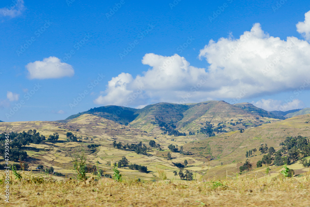 Fototapeta premium Panoramic View to the Simien Mountains in the Clouds from the Gondar Road, Northern Ethiopia