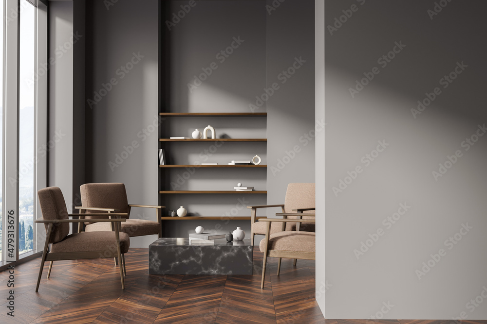 Fototapeta premium Dark living room interior with empty grey wall, four armchairs
