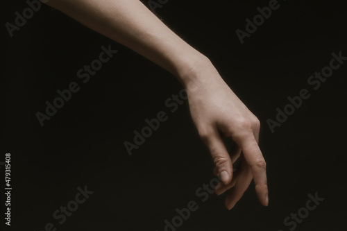 Woman hands in the dark in barokko style