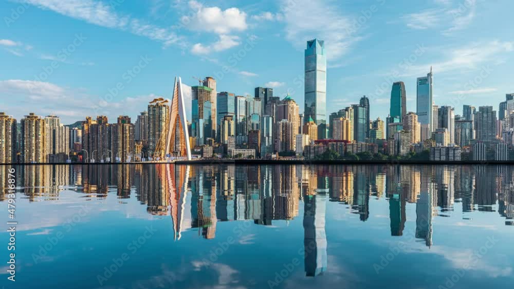 4k time lapse. Panoramic city skyline and modern commercial buildings with water reflection in Chongqing, China. 4k time lapse. Panoramic city skyline and modern commercial buildings with water reflection in Chongqing, China.