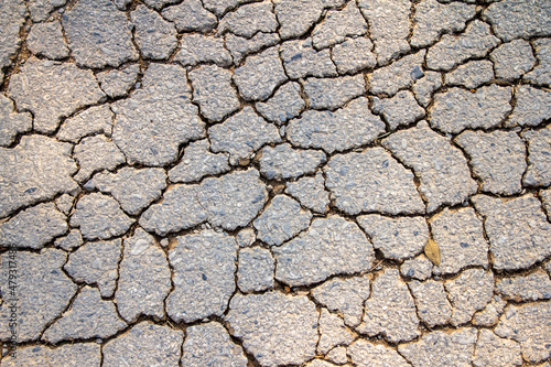 asphalt road with cracks