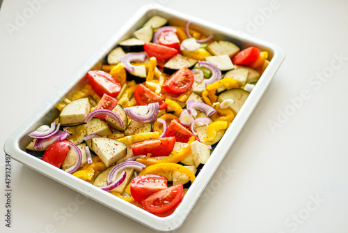 Oven Baking Vegetables, Peppers, Zucchini, Tomatoes on a Baking Tray, Sheet Pan Vegetables Background