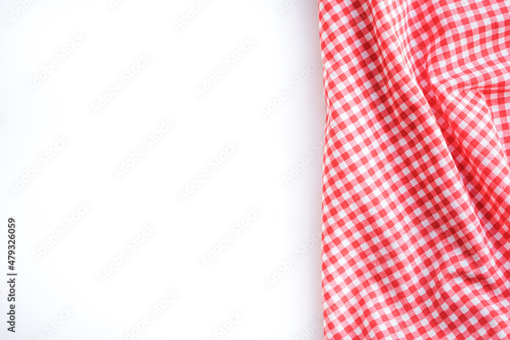 crumple pink plaid fabric or tablecloth on white background with copy space crumple pink plaid fabric or tablecloth on white background with copy space