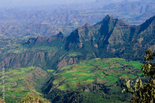 Panoramic View to the Simien Mountains Green Valley under Blue Sky near Gondar, Northern Ethiopia photo