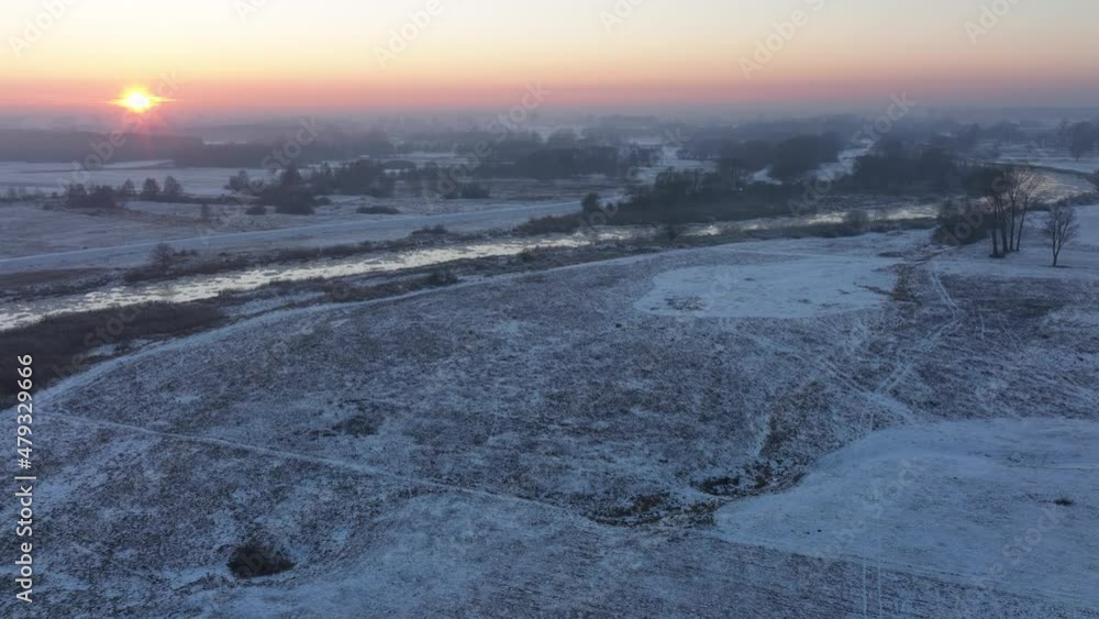 Hyperlapse of winter sunset over the fields with river in poland Hyperlapse of winter sunset over the fields with river in poland