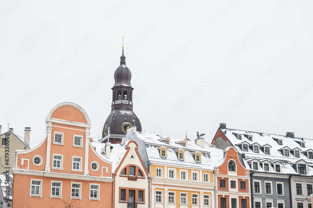 Winter cityscape of Old town of Riga, Latvia. Modern architecture. Snow on roof.