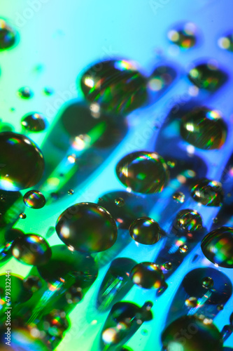 Abstract close-up colorful blob texture background. Drop macro background.