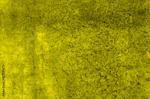 Yellow concrete wall surface with crack and grunge texture for background