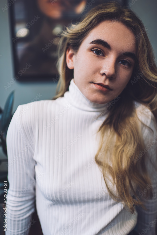 Wistful woman with long blond hair Wistful woman with long blond hair