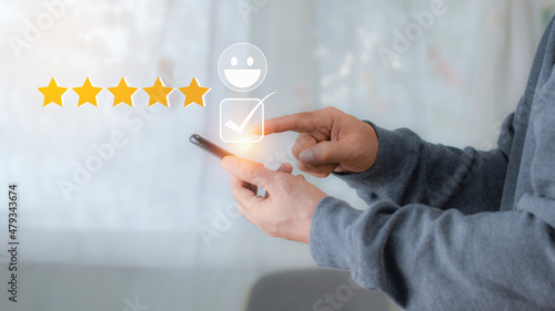 Wallpaper Mural Businessman touches the virtual screen on the happy smiley face icon to give five stars rating. Very satisfied and impressed in service. Customer service and Satisfaction concept. Torontodigital.ca