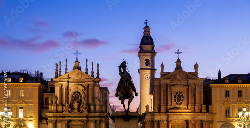 Silhouette of San Carlo Square (Piazza di San Carlo), in Torino city, Piemonte, Italy during sunset. There is the equestrian monument of Emmanuel Philibert and twin churches Santa Cristina - San Carlo photo