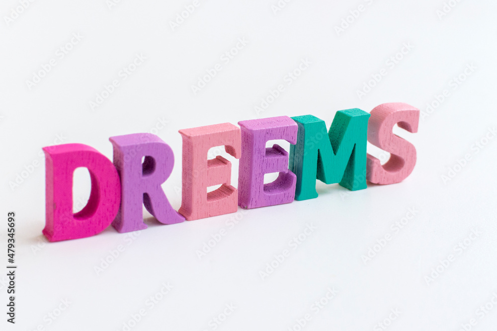 Dreams! The inscription from multi-colored letters on a white background. Beautiful card. Hand drawing, design elements. Dreams! The inscription from multi-colored letters on a white background. Beautiful card. Hand drawing, design elements.