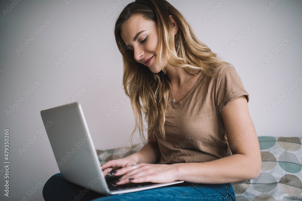 Caucasian female freelancer doing distance job connecting to wifi internet on modern laptop computer, skilled woman 20s searching website for making social networking during free leisure time Caucasian female freelancer doing distance job connecting to wifi internet on modern laptop computer, skilled woman 20s searching website for making social networking during free leisure time