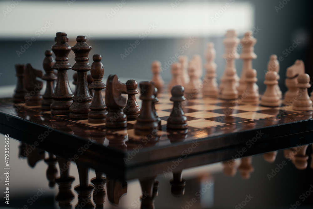 Chess set on the chess board. With selective focus on black pieces. Set of chess figures. Strategy concept Chess set on the chess board. With selective focus on black pieces. Set of chess figures. Strategy concept