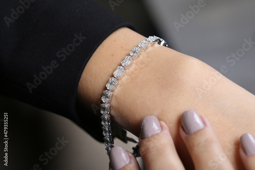 gold and diamond women's fashion and accessories. Hand Model Jewelry Piece. women bracelet