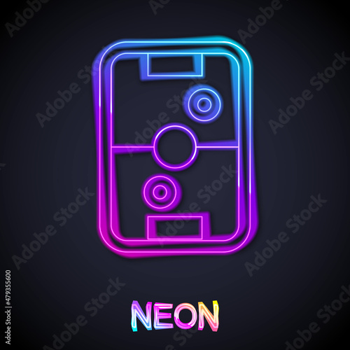 Glowing neon line Air hockey table icon isolated on black background. Vector