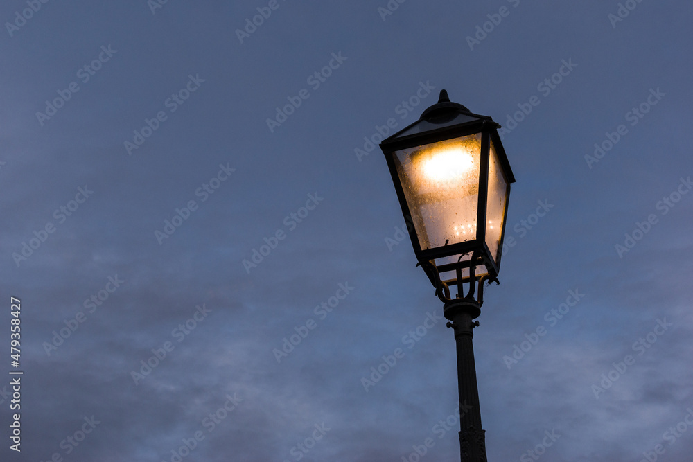 Retro style street light, lamp in the night Retro style street light, lamp in the night