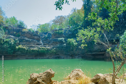 Beautiful Pandav falls lake at Panna National Park, Madhya Pradesh, India. It is located in Panna and Chhatarpur districts of Madhya Pradesh in India. It has an area of 542.67 km2, a tiger reserve. photo