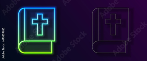 Glowing neon line Holy bible book icon isolated on black background. Vector