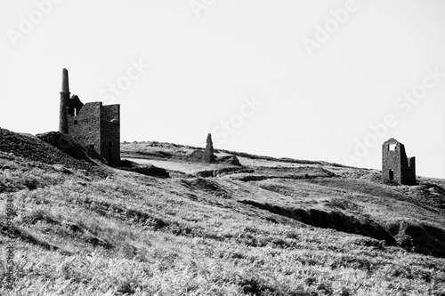 old mine ruins at botallack in infrared black and white cornwall uk 