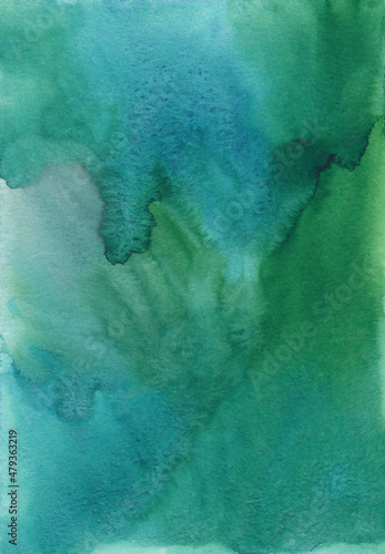 Abstract green watercolor background texture, hand painted. Artistic emerald color backdrop, stains on paper. Sea green aquarelle painting wallpaper.