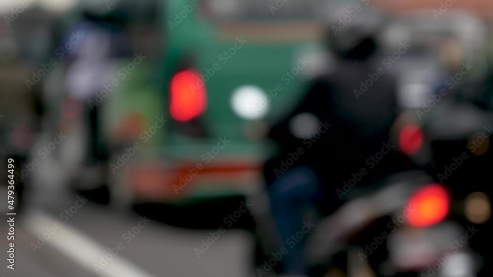 Traffic lights on the street. Blurred bokeh defocused effect light Traffic lights on the street. Blurred bokeh defocused effect light