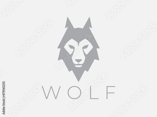 Concept wolf head logo design. Wild predator animal icon. Wildlife silhouette symbol. Vector illustration.