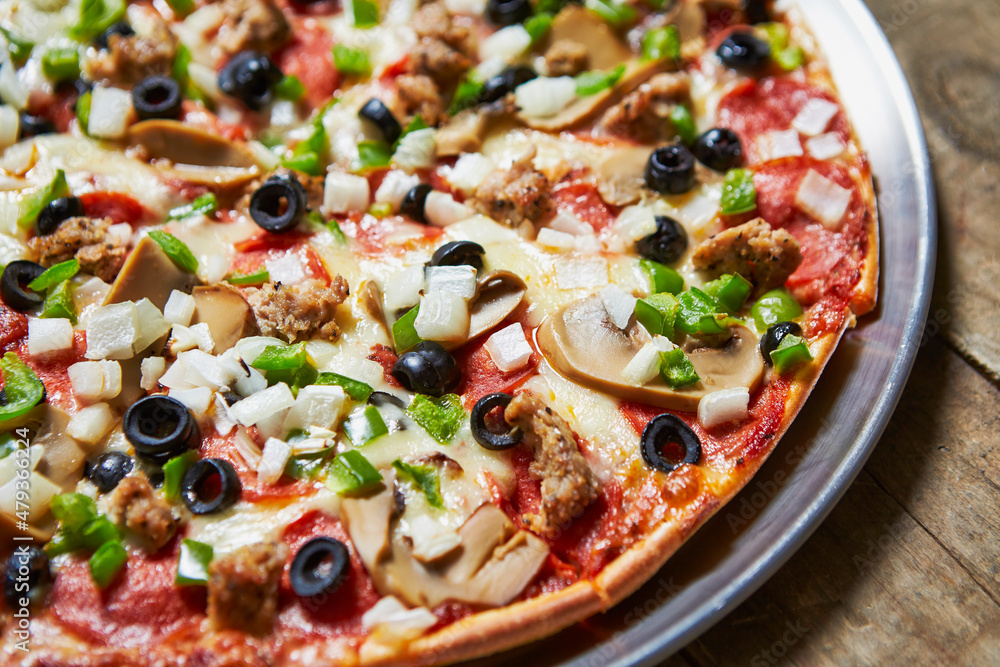 pizza with salami and olives pizza with salami and olives