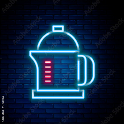 Glowing neon line French press icon isolated on brick wall background. Colorful outline concept. Vector