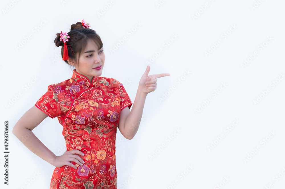 Portrait beautiful asian woman in Cheongsam dress on white background,Thailand people,Happy Chinese new year concept,Happy asian lady in chinese traditional dress Portrait beautiful asian woman in Cheongsam dress on white background,Thailand people,Happy Chinese new year concept,Happy asian lady in chinese traditional dress