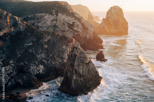 Cliffs in Miradouro da Praia do Caneiro, Atlantic Ocean, Portugal. photo