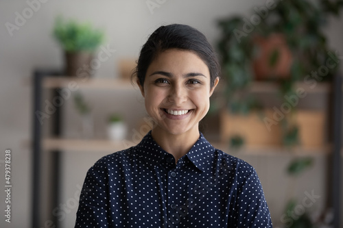 Photos Happy young millennial Indian business woman head shot portrait