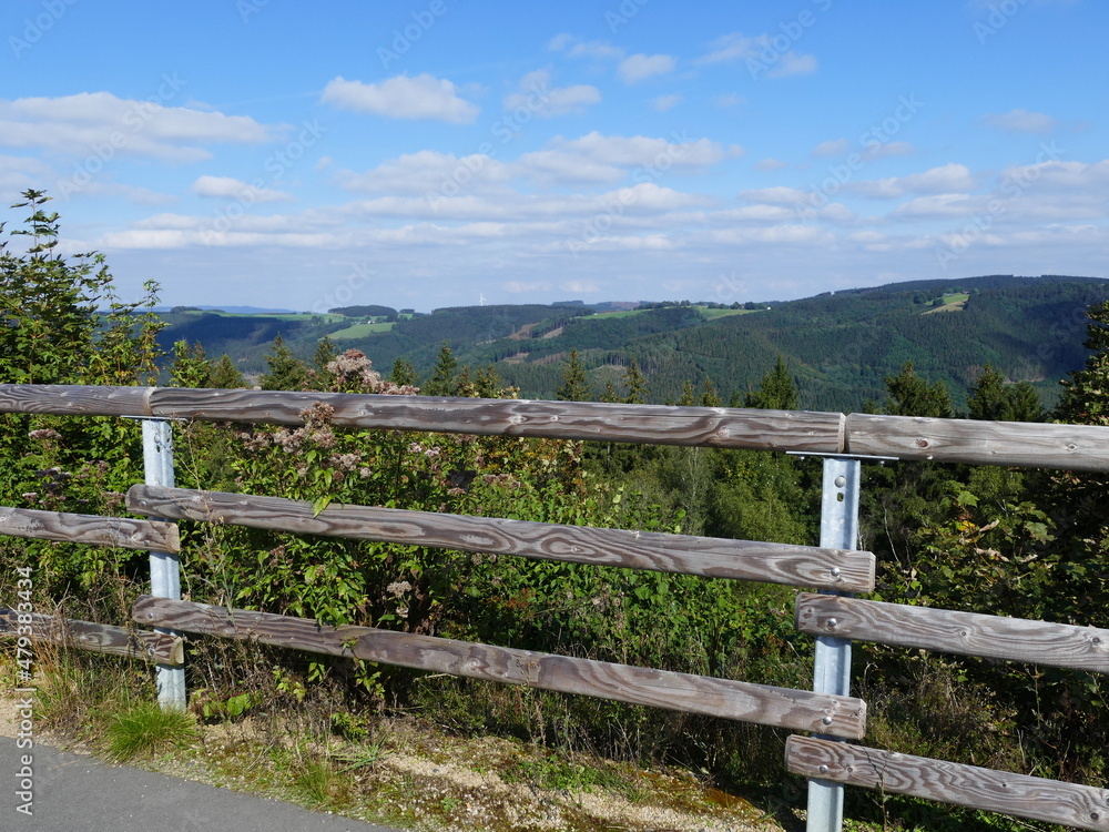 View from the circular path of the Glinge pumped hydroelectric energy storage, North Rhine-Westphalia, Germany, of the mountains and forests of the Sauerland Blick vom Rundweg des Speicherwerks Glinge