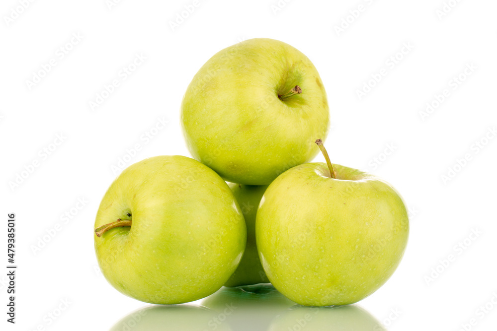 Several sweet green apples, close-up, isolated on white.